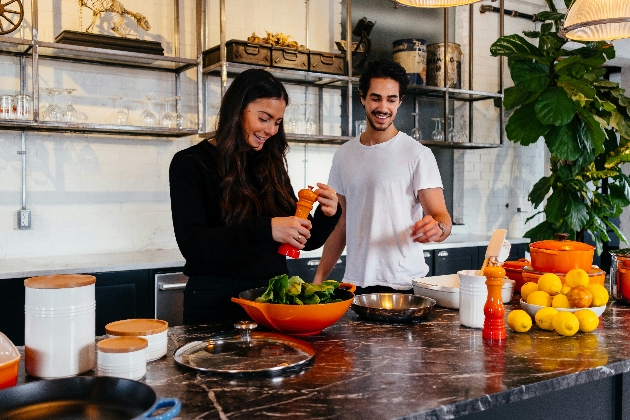 2 people cooking in a home kitchen